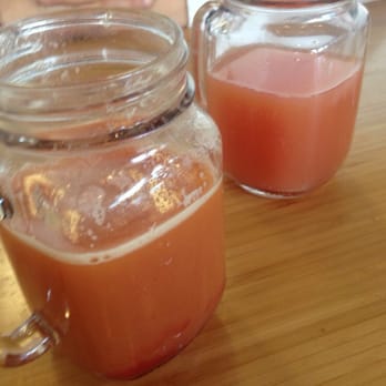 Early Bird - Mimosas! Strawberry (left) grapefruit (right) - New American Near Me - Fullerton, California