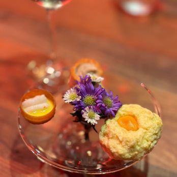Eculent - a glass of wine and a plate of food - New American Near Me - Kemah, Texas Eculent - a glass of wine and a plate of food - New American Near Me - Kemah, Texas