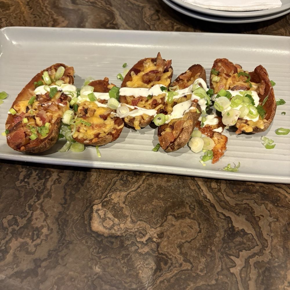 Raiders Tavern & Grill - Loaded potato skins - American Near Me - Henderson, Nevada Raiders Tavern & Grill - Loaded potato skins - American Near Me - Henderson, Nevada