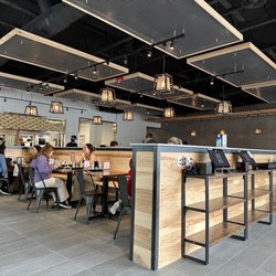 Dough Zone Dumpling House - Woodinville - Inside with to-go orders kiosks.