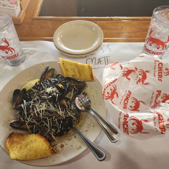 Tin City Waterfront Shops - YUMMY MUSSELS - Shopping Centers Near Me - Naples, Florida