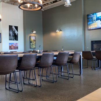 Village Pizza - a dining room with tables and chairs - Pizza Near Me - Albuquerque, New Mexico