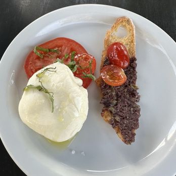 Outlaw Kitchens - Burrata appetizer at Outlaw Kitchens - New American Near Me - San Antonio, Texas Outlaw Kitchens - Burrata appetizer at Outlaw Kitchens - New American Near Me - San Antonio, Texas