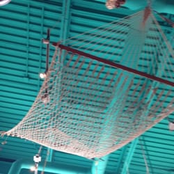Sea Fish n Chips - Fish net hanging from the ceiling.