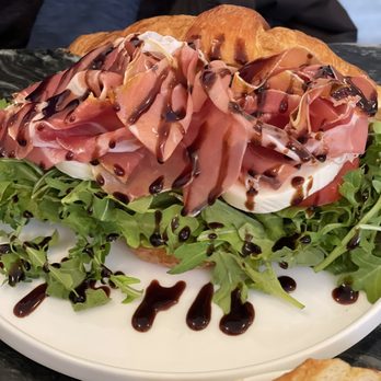 Dom's Coffee - Prosciutto, fresh mozzarella, tomato, arugula and balsamic drizzle! - Coffee & Tea Near Me - Avon, Connecticut Dom's Coffee - Prosciutto, fresh mozzarella, tomato, arugula and balsamic drizzle! - Coffee & Tea Near Me - Avon, Connecticut