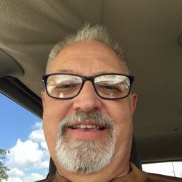 a man with glasses and a beard