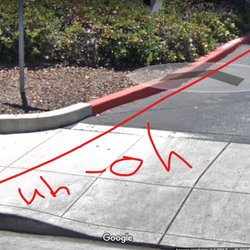 CURB AND SIDEWALK NOT LINED UP... UNSAFE!