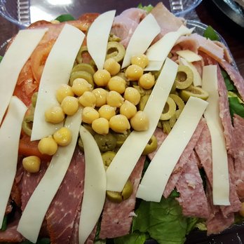 Santora's Pizza & Catering - Antipasto salad . Looks big because it's all greens at the bottom. - Pizza Near Me - Depew, New York