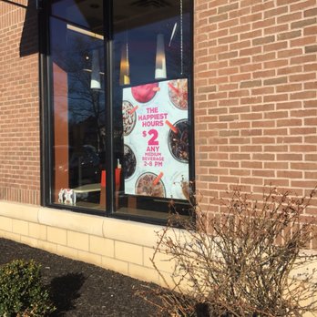Dunkin' -  a sign in the window of a dunkin donuts shop - Coffee & Tea Near Me - Florham Park, New Jersey
