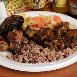 Da West Caribbean Bar & Grill - Oxtail and jerk chicken combo....