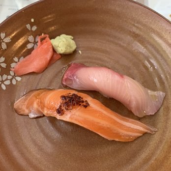 Umami Sushi - Bottom: Sake Toro Sushi Nigiri Top: Hamachi Sushi Nigiri - Japanese Near Me - San Marcos, Texas Umami Sushi - Bottom: Sake Toro Sushi Nigiri Top: Hamachi Sushi Nigiri - Japanese Near Me - San Marcos, Texas