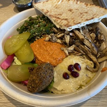 Falafill - Falafel and chicken shawarma bowl with some Muhammara and babgonouch. Love the pomegranate garnish! - Middle Eastern Near Me - Schaumburg, Illinois