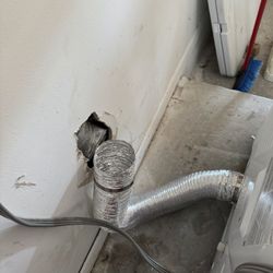 BRANDSMART - DEERFIELD - They left it like that with the dryer pushed back.  Buyer Beware!!!!!!