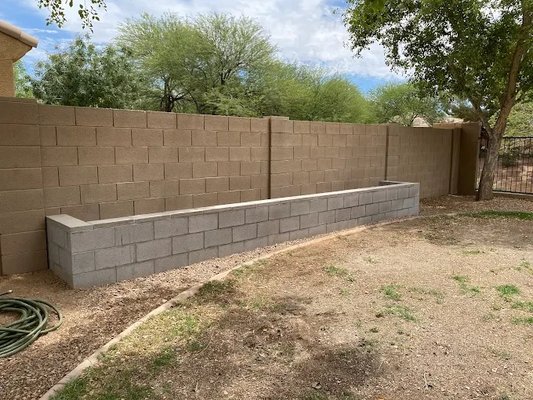 Retaining Wall Installation & Repair - Welcome to Desert Rock Concrete and Masonry, your leading concrete and masonry contractor in Gilbert, AZ and the surrounding area. With Desert Rock Concrete and Masonry, one simple call ensures that you get the exact service that you need. From foundations to new patios, our concrete experts ensure safety and longevity in every building project. With over 29+ years of experience, you rely on us to handle your concrete work and paving with expediency and superior quality standards. We pride ourselves on delivering efficient, affordable assistance and we are not satisfied until our customers are. Regardless of the task at hand, we will always respect your preferences, schedule, and budget. Contact Desert Rock Concrete and Masonry today and we'll give you a comprehensive description of all the services that we offer. Retaining Wall Installation & Repair - Welcome to Desert Rock Concrete and Masonry, your leading concrete and masonry contractor in Gilbert, AZ and the surrounding area. With Desert Rock Concrete and Masonry, one simple call ensures that you get the exact service that you need. From foundations to new patios, our concrete experts ensure safety and longevity in every building project. With over 29+ years of experience, you rely on us to handle your concrete work and paving with expediency and superior quality standards. We pride ourselves on delivering efficient, affordable assistance and we are not satisfied until our customers are. Regardless of the task at hand, we will always respect your preferences, schedule, and budget. Contact Desert Rock Concrete and Masonry today and we'll give you a comprehensive description of all the services that we offer.