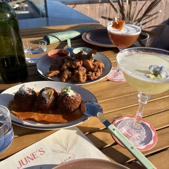 June's - Drinks: Honeymooner & Nostalgia Food: Zatar popcorn chicken & Arancini - Cocktail Bars Near Me - Eastvale, California June's - Drinks: Honeymooner & Nostalgia Food: Zatar popcorn chicken & Arancini - Cocktail Bars Near Me - Eastvale, California