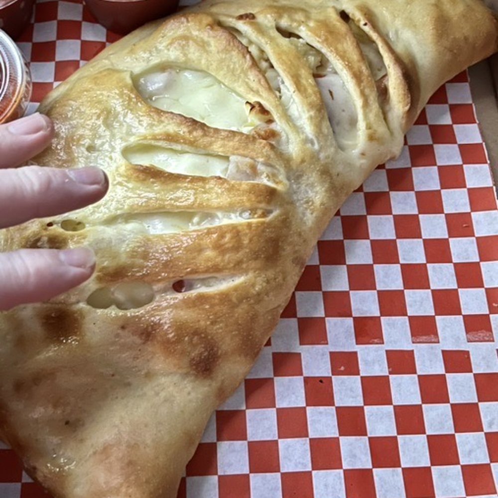 Graziano's Pizzaria - Calzone. Yeah it's big... - Pizza Near Me - Oceanside, California Graziano's Pizzaria - Calzone. Yeah it's big... - Pizza Near Me - Oceanside, California