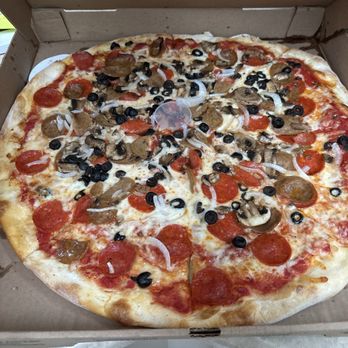 Michaelangelos Pizza and Subs - Another one folded edges, so good the best! - Italian Near Me - Surf City, North Carolina