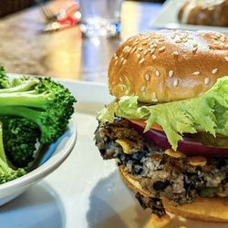 Depot Bar And Grill - Black bean veggie burger with a side of steamed broccoli.