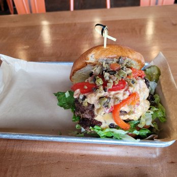 Tipsy Steer - Pimento and Olive Burger. 2 patties. - Tacos Near Me - Minneapolis, Minnesota Tipsy Steer - Pimento and Olive Burger. 2 patties. - Tacos Near Me - Minneapolis, Minnesota