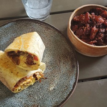 Bearcat CBD - Steak, Egg & Cheese Grilled Burrito and the almost burnt crispy potatoes. - Coffee & Tea Near Me - New Orleans, Louisiana