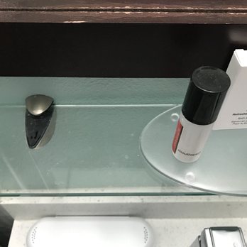 Capri Laguna - Bathroom shelf in room two. The picture doesn't capture the dust very well. - Hotels Near Me - Laguna Beach, California Capri Laguna - Bathroom shelf in room two. The picture doesn't capture the dust very well. - Hotels Near Me - Laguna Beach, California