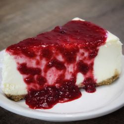 Garden Patch Restaurant & Sports Arena - Our NEW cheesecake! Choice of Caramel, Chocolate, or Raspberry Sauce!