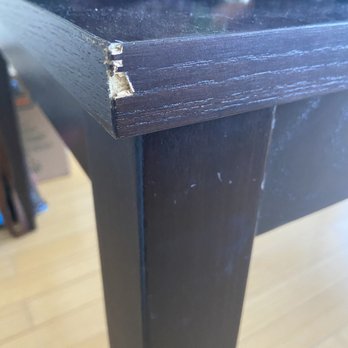Pasadena Moving Company - Chipped wood on dining table - Movers Near Me - Pasadena, California Pasadena Moving Company - Chipped wood on dining table - Movers Near Me - Pasadena, California