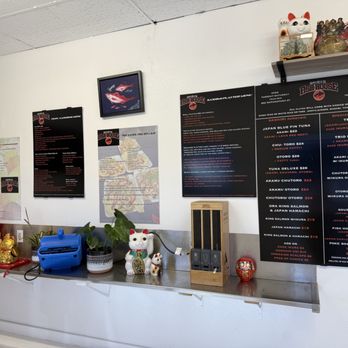 Souza's Fish House - Inside with a ton of menus - Poke Near Me - Honolulu, Hawaii Souza's Fish House - Inside with a ton of menus - Poke Near Me - Honolulu, Hawaii
