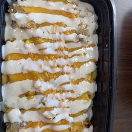 Mashed potatoes with pulled chicken, roasted corn, caramelized onions, sharp cheddar, and ranch- YUM!