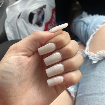 Diamond Nail Spa - My left hand. Cuticles not cleaned up , lifting on 3/5 nails & the layers of acrylic have dents in them. - Nail Salons Near Me - Indianapolis, Indiana