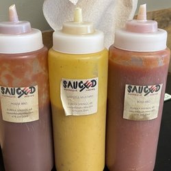 SAUCED Barbeque & Brews - BBQ sauces on every table