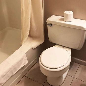 Village Inn Motel - MH Village Inn Motel MI Guestroom Bathroom - Hotels Near Me - Holt, Michigan Village Inn Motel - MH Village Inn Motel MI Guestroom Bathroom - Hotels Near Me - Holt, Michigan