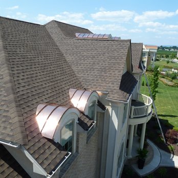 Vera Construction - Metal (copper) roof as an accent on the shingles roof - Roofing Near Me Vera Construction - Metal (copper) roof as an accent on the shingles roof - Roofing Near Me