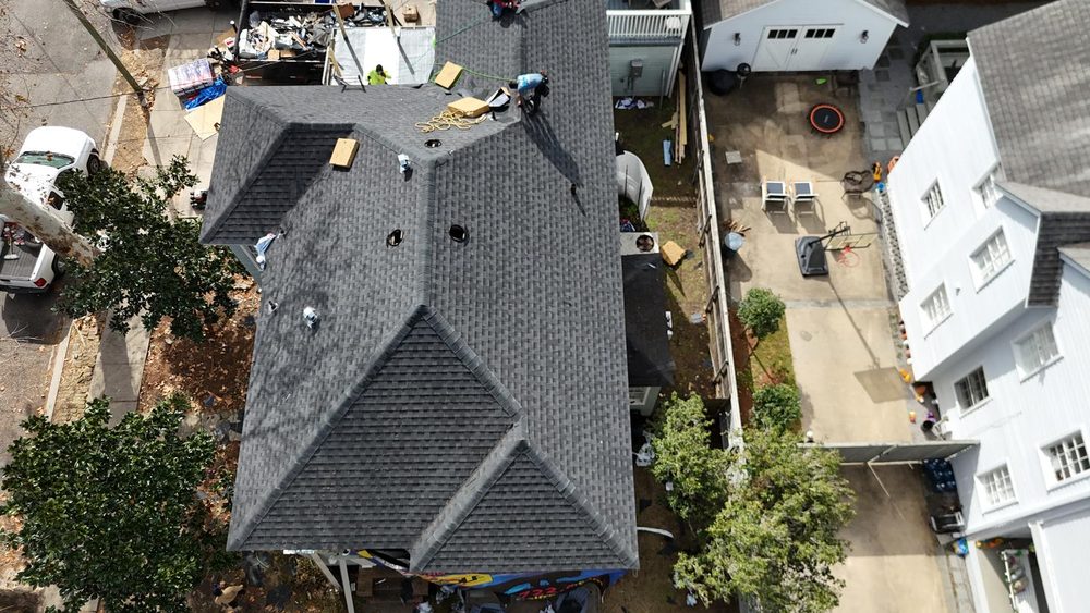 Slide of Lone Wolf Roofing