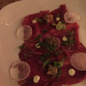 Ricardo's Kitchen + Bar - 50 day aged filet mignon beef carpaccio that melts in your mouth - Steakhouses Near Me - Lacey, Washington Ricardo's Kitchen + Bar - 50 day aged filet mignon beef carpaccio that melts in your mouth - Steakhouses Near Me - Lacey, Washington