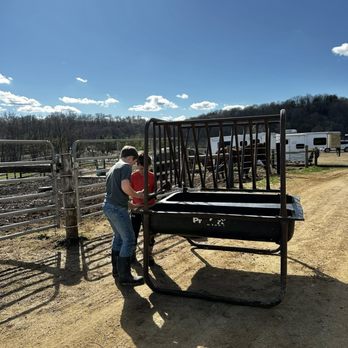 River Ridge Stables - The Ranch boys hard at work fixing a hay feeder. - Horseback Riding Near Me - Platteville, Wisconsin River Ridge Stables - The Ranch boys hard at work fixing a hay feeder. - Horseback Riding Near Me - Platteville, Wisconsin