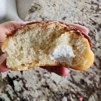 Krispy Kreme - If you look hard enough, you'll see a little bit of filling. - Donuts Near Me - Crofton, Maryland