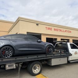Costco Tire Center - Seems like she is always on a tow truck!!