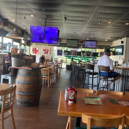man sitting at a bar
