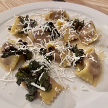 Wynona - Beet honey agnolotti, poppy seed butter, sherry vinegar gastrique, currants, red kale, and ricotta salata - Italian Near Me - Toronto, Ontario Wynona - Beet honey agnolotti, poppy seed butter, sherry vinegar gastrique, currants, red kale, and ricotta salata - Italian Near Me - Toronto, Ontario