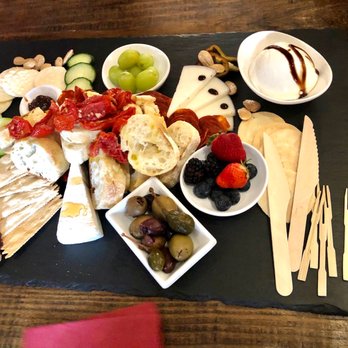 Casa De Vino 57 - Cheese board: Brie, drunken goat cheese, Buffalo mozzarella, duck prosciutto and chorizo! - Wine Bars Near Me - St Augustine, Florida Casa De Vino 57 - Cheese board: Brie, drunken goat cheese, Buffalo mozzarella, duck prosciutto and chorizo! - Wine Bars Near Me - St Augustine, Florida