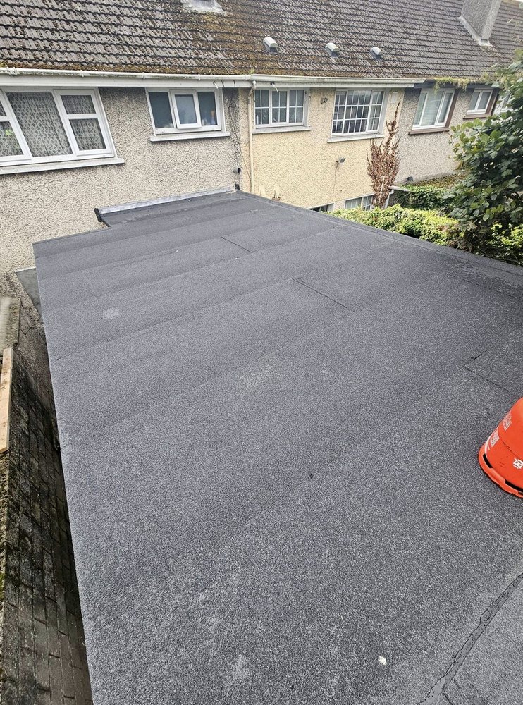 Slide of Pecan Park Roofing