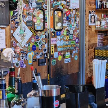 The Beer Hog - a bar with a bunch of beer bottles - Beer Bar Near Me - Pelham, Alabama
