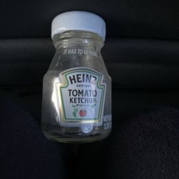 Tiny ketchup bottle that comes with kids chicken and fry's