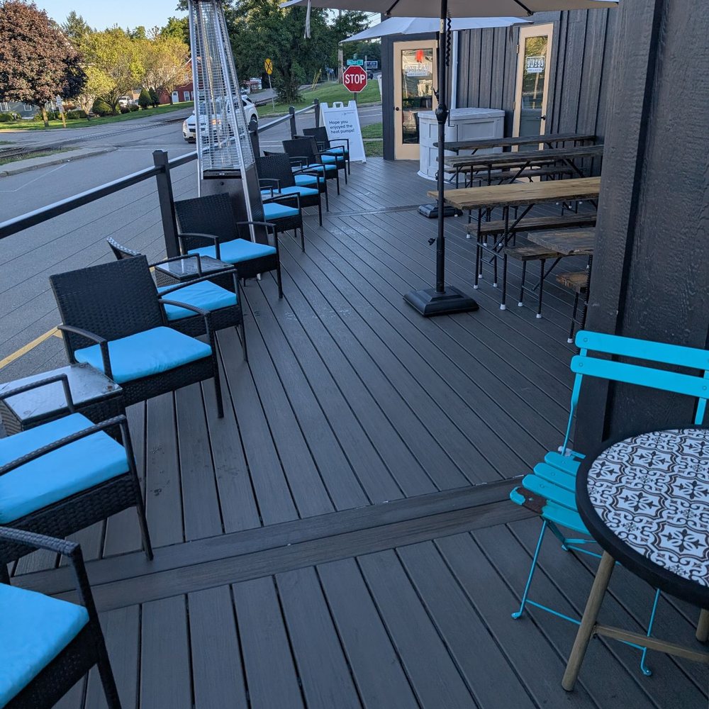 Owego Donut & Beer - Outdoor seating area, there's a few more behind me as I take this picture - Donuts Near Me - Owego, New York