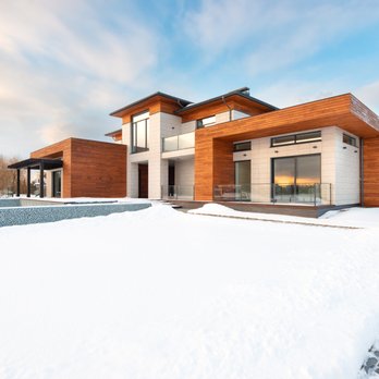 Partner Construction - a modern home in the snow - General Contractors Near Me - Huntington Beach, California Partner Construction - a modern home in the snow - General Contractors Near Me - Huntington Beach, California