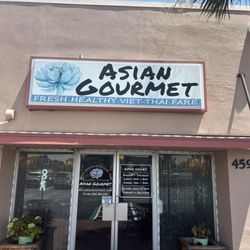 Asian Gourmet - Melbourne - Front door of the Asian Gourmet with hours listed
