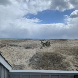 Blocked view of beach and ocean from second floor balcony