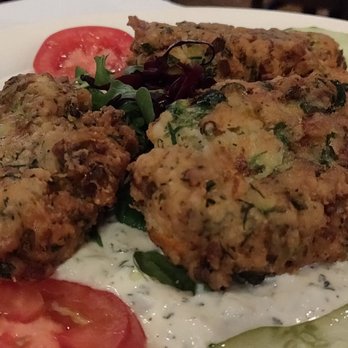 Cafe Istanbul - Mujver- pan fried zucchini pancakes with scallions and feta in a full, creamy yogurt sauce. Full of flavor and not greasy. - Turkish Near Me - Chicago, Illinois Cafe Istanbul - Mujver- pan fried zucchini pancakes with scallions and feta in a full, creamy yogurt sauce. Full of flavor and not greasy. - Turkish Near Me - Chicago, Illinois