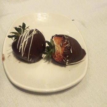 Sullivan's Steakhouse - Milk chocolate covered strawberries with dark chocolate injected in the center of strawberry which was nasty!! - Steakhouses Near Me - Detroit, Michigan